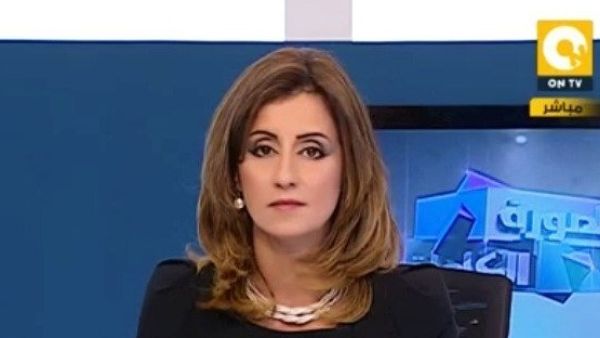 Liliane Daoud was escorted to the terminal by security officers without any luggage. (copts-united.com)