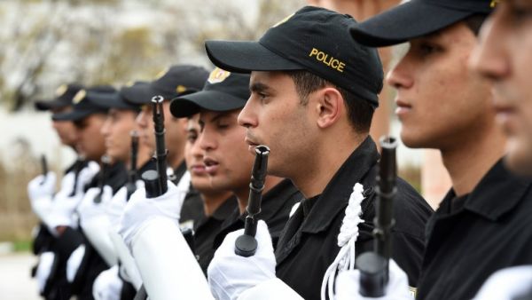 Tunisian police stand in line during a press conference held by Tunisia's Interior Minister Mohamed Gharsalli on March 26, 2015 in Tunis. (AFP/File) Tunisian police stand in line during a press conference held by Tunisia's Interior Minister Mohamed Gharsalli on March 26, 2015 in Tunis. (AFP/File)