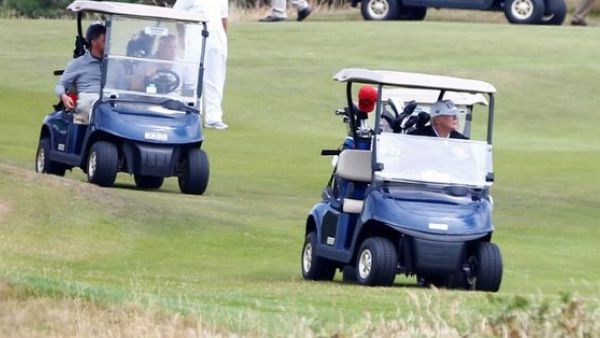 Trump plays golf in Scotland (Twitter)