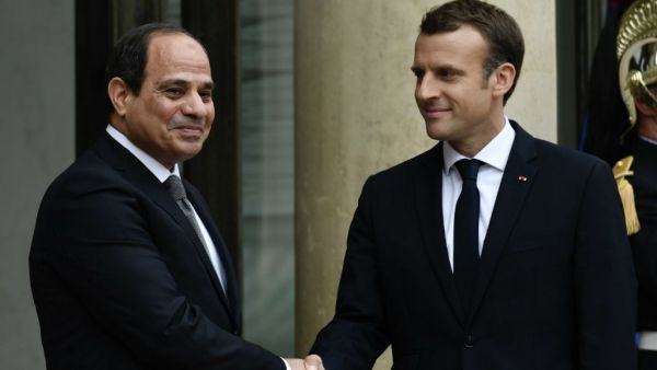 French President Emmanuel Macron welcoming Egypt's President Abdel Fattah al-Sisi in October 2017. (AFP)