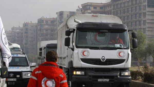 After a months-long and recently very public siege by Syrian government troops and Hezbollah, some 40,000 residents in the Damascus countryside city are finally receiving aid. (AFP/File)