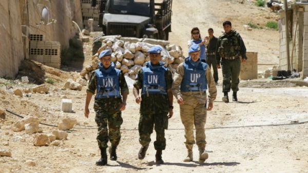 UN observers in Madaya, 2012 (AFP / Loai Beshara)