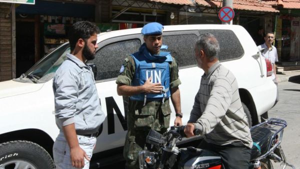 After a social media outcry, Assad is allowing food convoys into the Syrian city, but the aid group says more still needs to be done. (AFP/File)