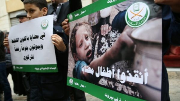 Things keep getting worse—and more public—in the besieged city outside Damascus. (AFP/File)