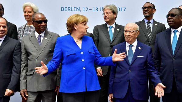 German Chancellor Angela Merkel and other leaders pose for a picture during the two-day G20-Africa partnership investment conference in Berlin on June 12, 2017. (John Macdougall/ AFP) 