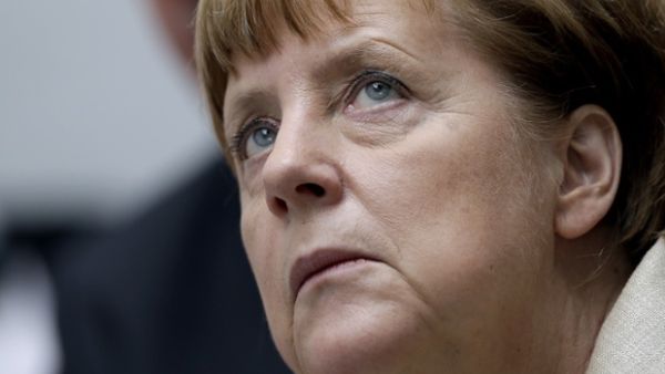 Chancellor Angela Merkel was criticized Thursday for appearing indifferent to the Palestinian girl's story and trying to stroke her hair. (AFP/File)