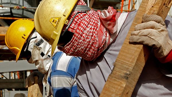 Migrant workers, AFP/File 