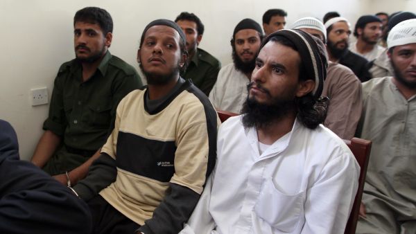Suspected al-Qaeda militants attend their trial at a state security court in Sana'a on Tuesday. Photo for illustration purposes only. (Mohammed Huwais/AFP)