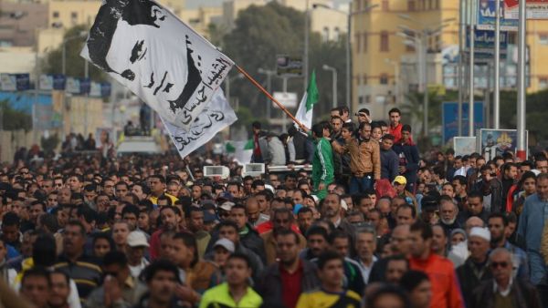 Egyptians attend the funeral procession of Abdelhalim Mehana, who was killed during clashes with riot police in Port Said on March 4. AFP PHOTO / KHALED DESOUKI