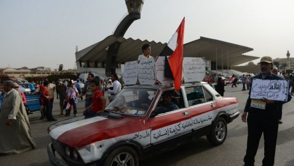 Egyptian protestors take part in demonstration to show their support for their country's military and against the ruling Muslim Brotherhood. (AFP PHOTO / KHALED DESOUKI)