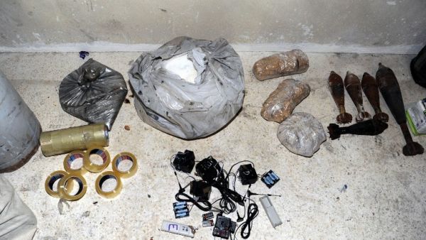 A handout picture released by the Syrian Arab News Agency (SANA) on August 24, 2013 shows bags of what the Syrian government claims to be materials used to make chemical weapons discovered in Jobar on the outskirts of the capital Damascus. (AFP)