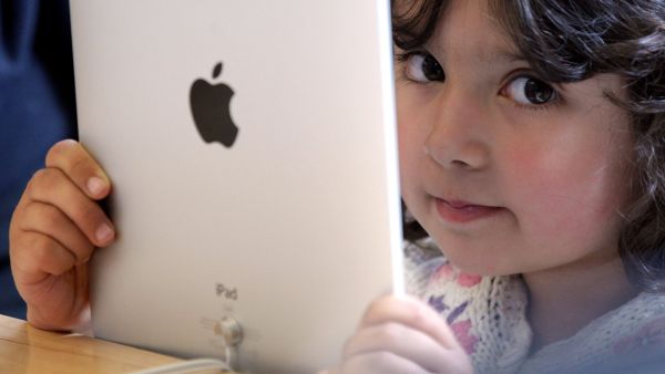 'These children lead sedentary lives with their gadgets' in UAE, says a doctor while texting on her phone. 