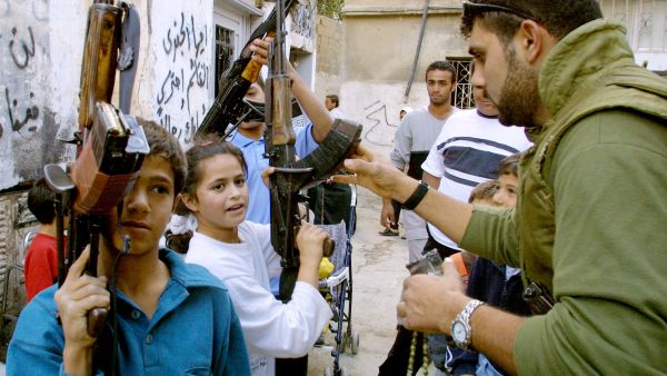 Girls as young as seven are in the training centres where Gaddafi is training up teenage boys and girls to take up arms against the 'crusader' enemy
