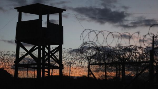 A watch tower looms above a now-closed area of the U.S. prison in Guantanamo Bay. (source: Joe Raedle/Getty Images)