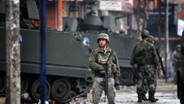 The head of a jihadist group behind the suicide bomb attack on the Iranian embassy in Lebanon in November is arrested, reports say. [AFP]