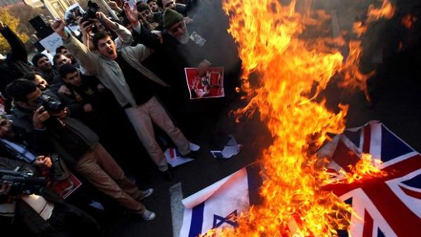 Angry protestors in Tehran stormed the British embassy two years ago causing the two countries to sever ties (Getty)
