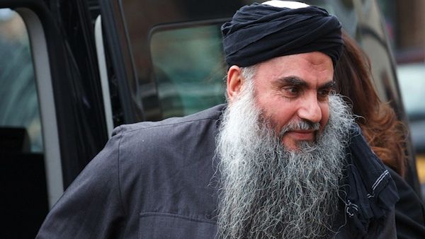 Abu Qatada, seen here in an old photo before he was brought back to Jordan for his trial, is charged with conspiring to carry out a terrorist attack on the American school in Amman, among other things. (AFP/File)