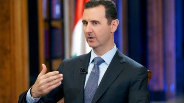 President Assad told China TV that Syria has always been committed to upholding its treaties, and was "not concerned" with current UN talks about military force in Syria (AFP) President Assad told China TV that Syria has always been committed to upholding its treaties, and was "not concerned" with current UN talks about military force in Syria (AFP)