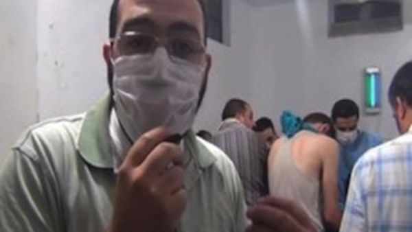 In footage uploaded to YouTube, doctors explained the symptoms of those killed by the nerve gas agent. (YouTube/BBC)