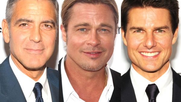 Silicon figures of George Clooney, Brad Pitt, and Tom Cruise surround the tables of "Taste of Fame" in Dubai (Image courtesy of UK eonline.com)