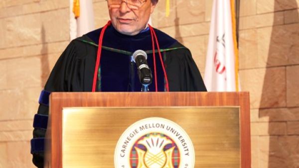 Dean Ilker Baybars addressing students at the ceremony