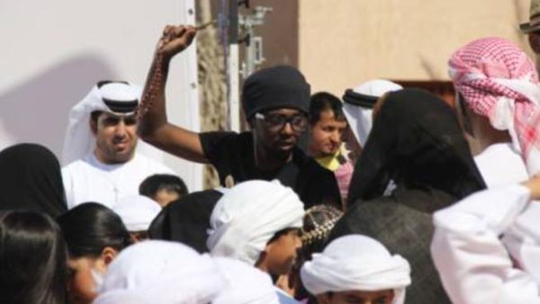 Director Abdul Aziz Ahmad on the set of the music video for the 2012 UAE National Day song, "Ya Khalifatna", at Abu Dhabi Heritage Village on the Corniche breakwater.

