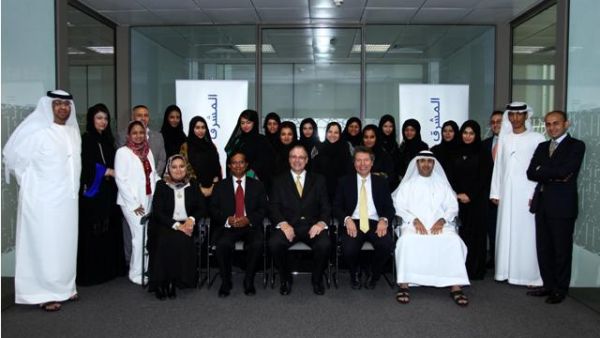 Douglas Beckett,  Head of Retail Banking Group - Mashreq, with the graduates in Abu Dhabi.
