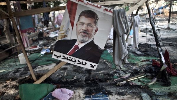 Morsi is planning on suing the Egyptian government over his ousting in July, his lawyers said Wednesday. (AFP/File)