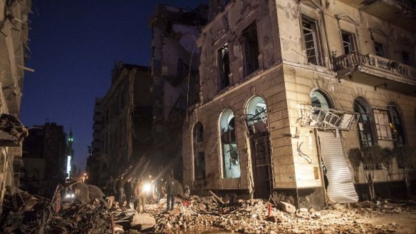 A picture taken in the early hours of December 24, 2013 shows destruction in the Egyptian city of Mansura, North of Cairo, following a powerful explosion. Some 12 people were killed. (AFP)