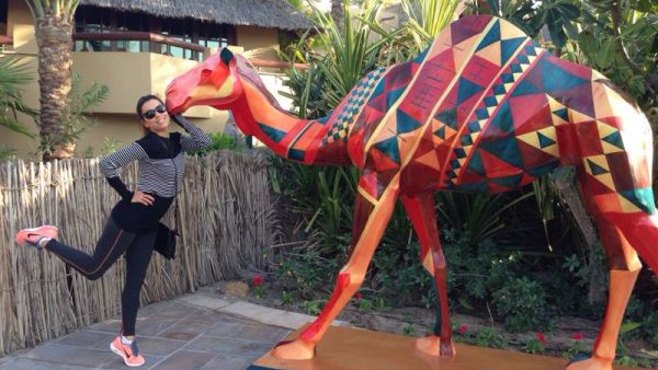 Eva Longoria loves on a camel in Dubai (Image: Facebook)