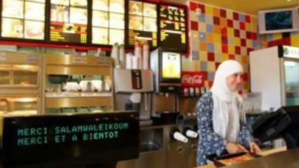 A woman at work in a fast food chain