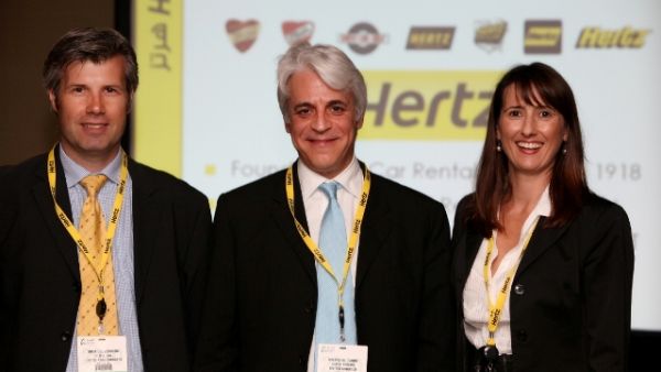 Michel Taride with Gina Costa and Nigel Johnson, Managing Director of Hertz UAE