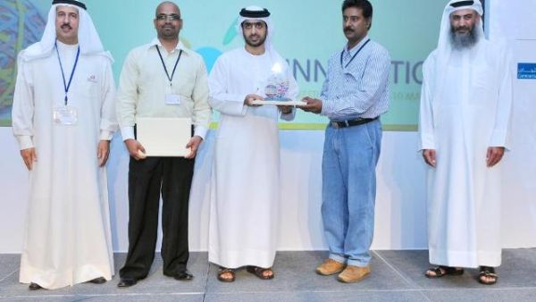 DUBAL receiving the awards