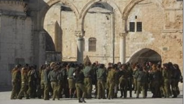 Israeli soldiers pictured in the al-Aqsa mosque compound on
Oct. 8. (Image courtesy of Maan Images/Al-Aqsa Foundation) Israeli soldiers pictured in the al-Aqsa mosque compound on
Oct. 8. (Image courtesy of Maan Images/Al-Aqsa Foundation)