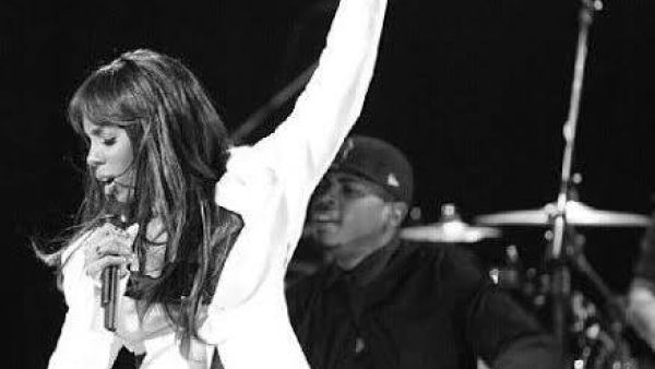 Kelly Rowland raising her left hand that now sports some serious bling! (Image: Facebook)