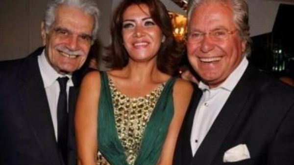 Hussein and ex-wife Liqa pose with legendary actor, Omar Sharif