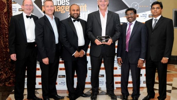 Ben Churchill, Managing Director of Emrill with other executives after receiving the award