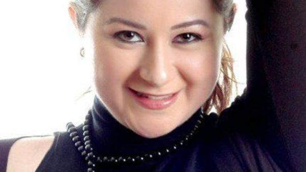 Like father like daughter: Mai Nour El Sherif poses with Nour El Sherif