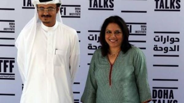 Indian film director of "The Reluctant Fundamentalist" Mira Nair stands along side Abdul Aziz Al Khater, the Chief Executive Officer of the Doha Tribeca Film Festival in the Qatari capital, on November 17, 2012.