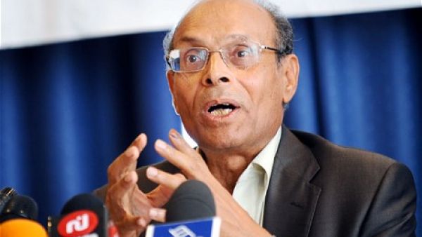 Tunisia's president Moncef Marzouki told reporters in Paris that his country "will get through this difficult phase. We are determined to promote a democratic process, whatever the present difficulties may be" (Courtesy of the Telegraph)