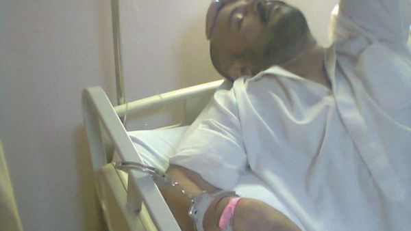 Mutaz Abu Rmeileh chained to his hospital bed