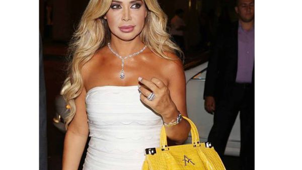 Nawal Al Zoghbi sportin' the new handbag.