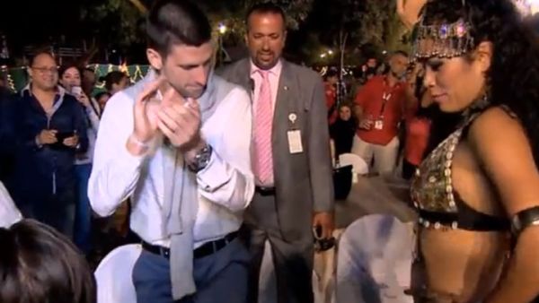 Novak giving belly dancing a try in Dubai. (Image: Youtube screenshot)