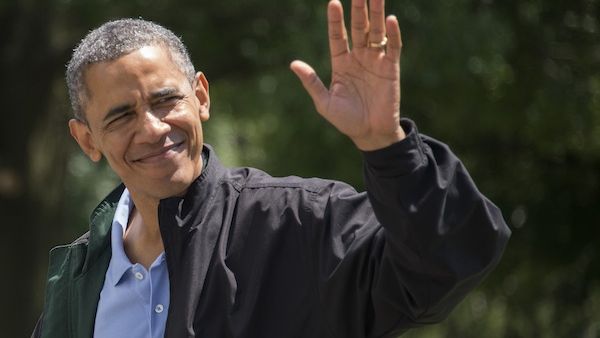 President Barack Obama waves as he returns to the White House in Washington on August 4. (AFP)