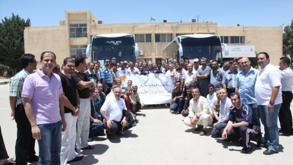 موظفو Orange لدى عودتهم من رحلة العمرة