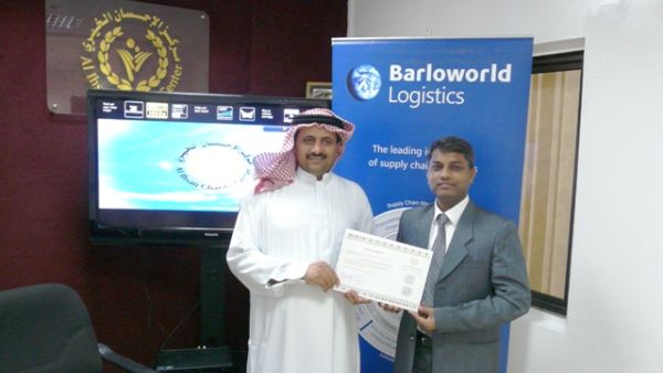 Barloworld Logistics Marketing & Communications Head, Sanjay More, receiving acknowledgement from Abdullah Aljaadi of Al Ihsan Charity Center, Ajman