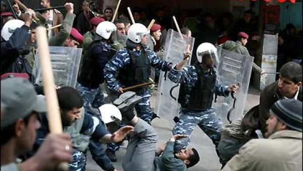 Palestinian police fight protesters in Ramallah. (AFP/File)