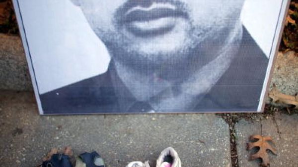 A poster of Iraqi journalist Muntazer Al-Zaidi, who famously threw a shoe at President George Bush in 2008.