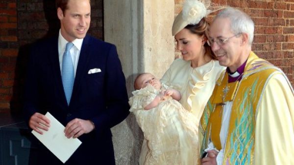 Britain's Prince William, Duke of Cambridge, and his wife Catherine, Duchess of Cambridge, leave with their son Prince George of Cambridge following his Christening by the Archbishop of Canterbury (R) at Chapel Royal at St. James's Palace. Baby George was christened using holy water from the Jordan River. (AFP)
