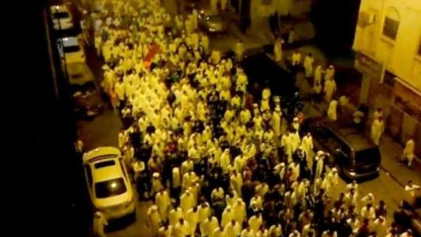 Unverifiable video still of protestors mourning the death in Qatif